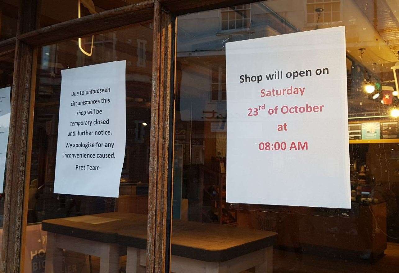 A sign in the cafe's window offers apologies to customers