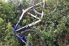 Cycle of flytipping. The bike dumped at Pineham. Picture: Peter Sherred