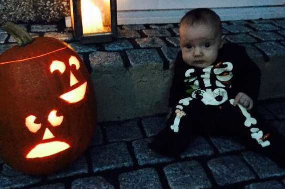 Stephen Sangster sent this one in of the pumpkin... and his little helper!