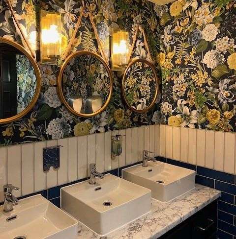 The ladies’ toilets followed through on the floral theme adopted in the dining area