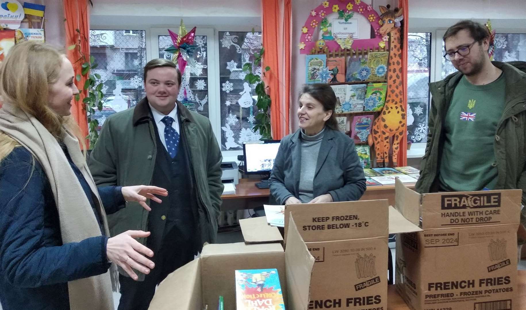 Donations are made to a library in Ukraine. Picture supplied by Cllr Jordan Meade