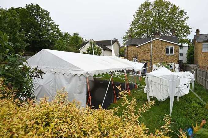A tent in the garden of a house in Consort Road, as police investigate the shooting of Sasha Johnson. Picture: Kirsty O’Connor/PA