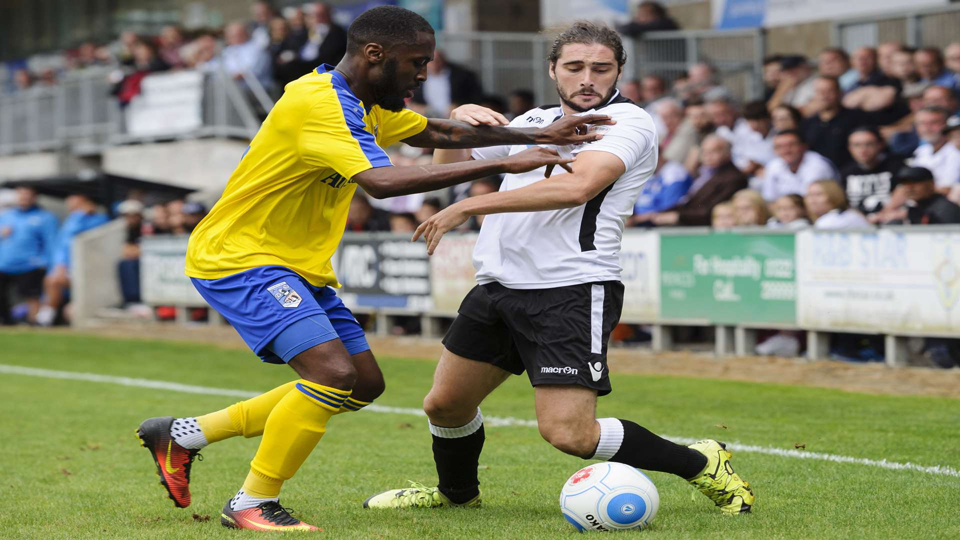 Dartford's Alex Brown is held back by Maidenhead. Picture; Andy Payton