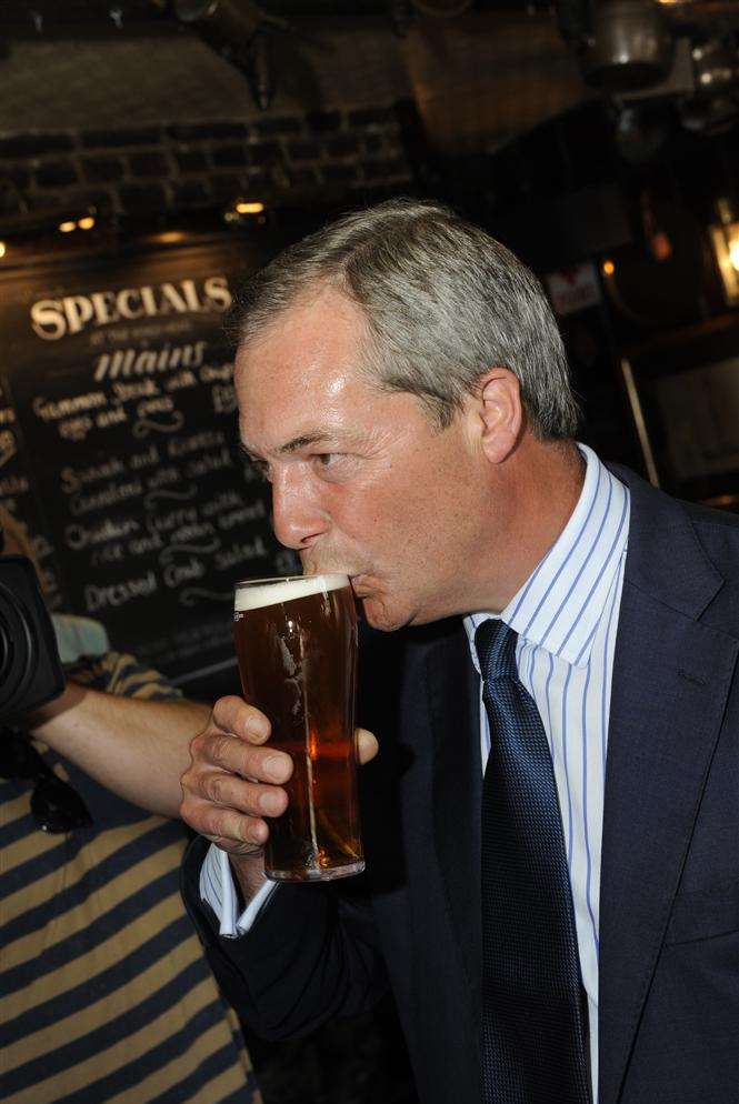 Nigel Farage enjoys a pint