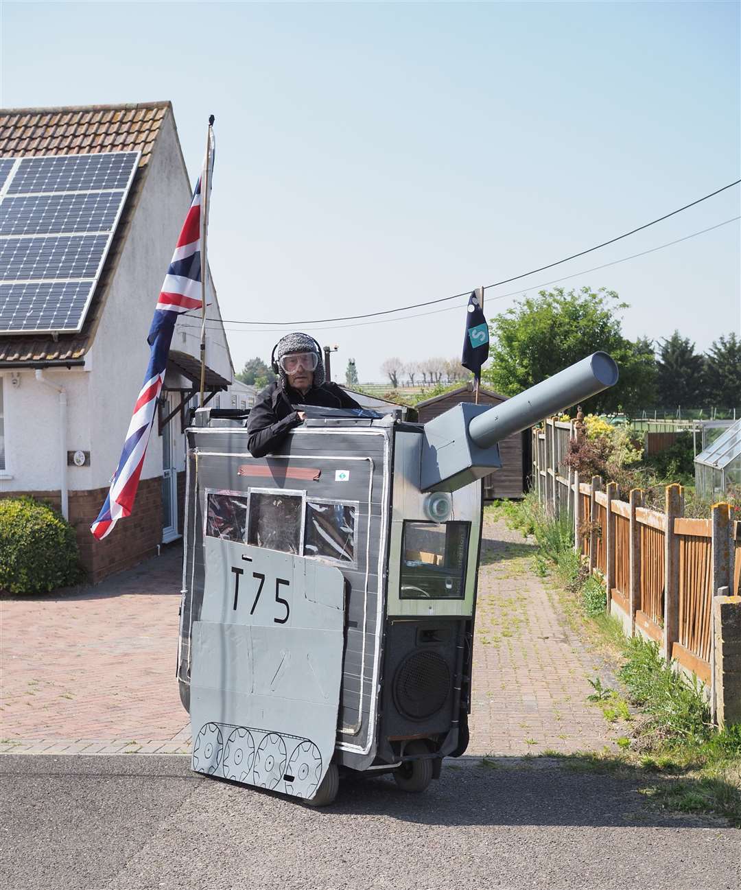 Sheppey pensioner Tim Bell, 75, marked the 75th anniversary of VE Day by decorating his mobility scooter as a tank. Pictured today ahead of the big day tomorrow. Picture: James Bell