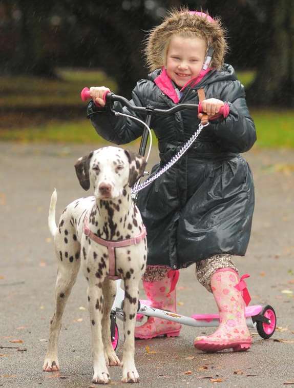 Kacie, seven, with Maddie the Dalmation in Gillingham Park