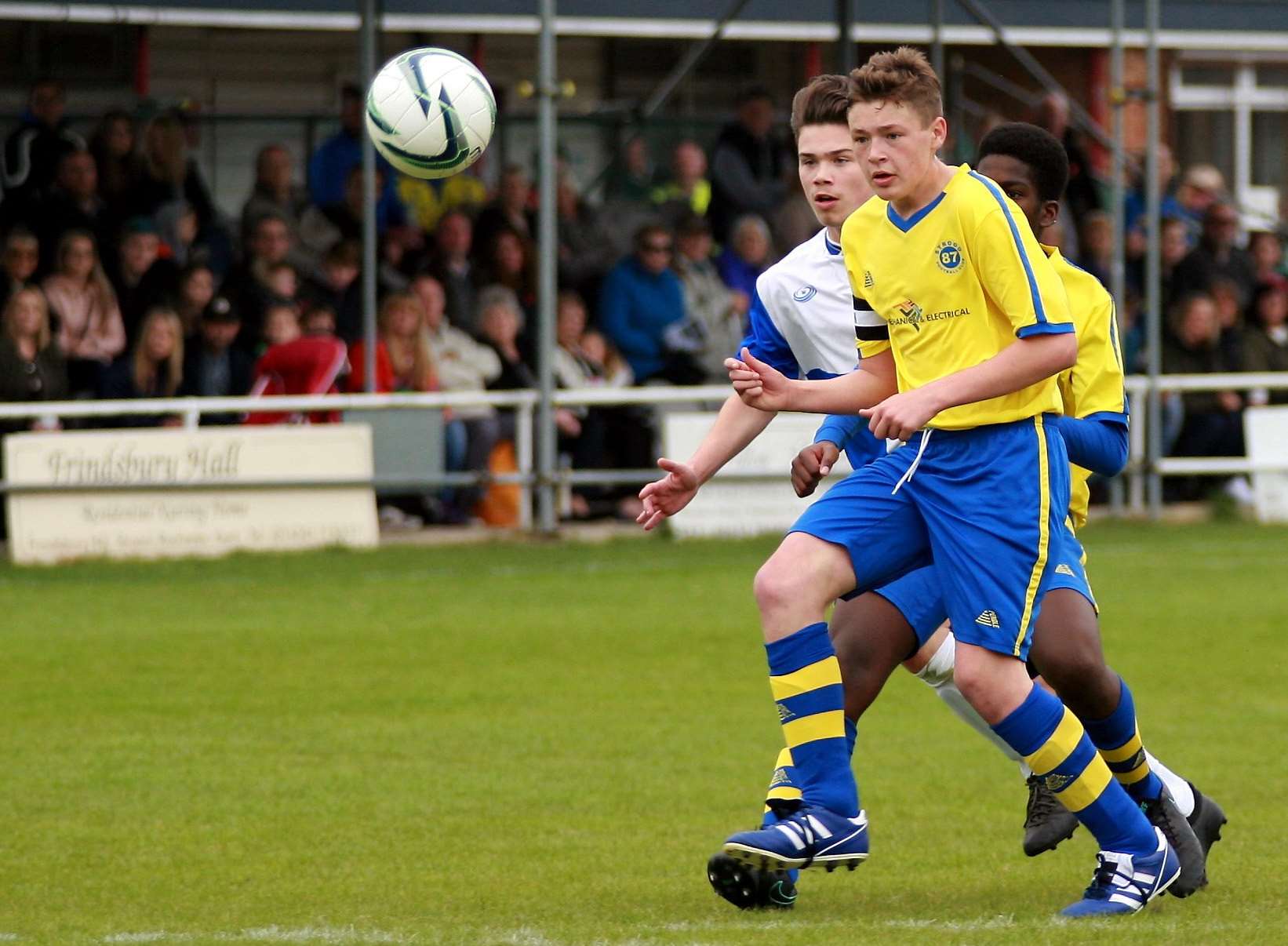 Strood 87 (yellow) take on Bredhurst Juniors in the under-15 cup final Picture: Phil Lee