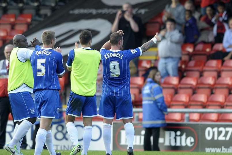 Callum Davies and team-mates thank the travelling Gills fans after their victory at Crewe. Picture: Barry Goodwin