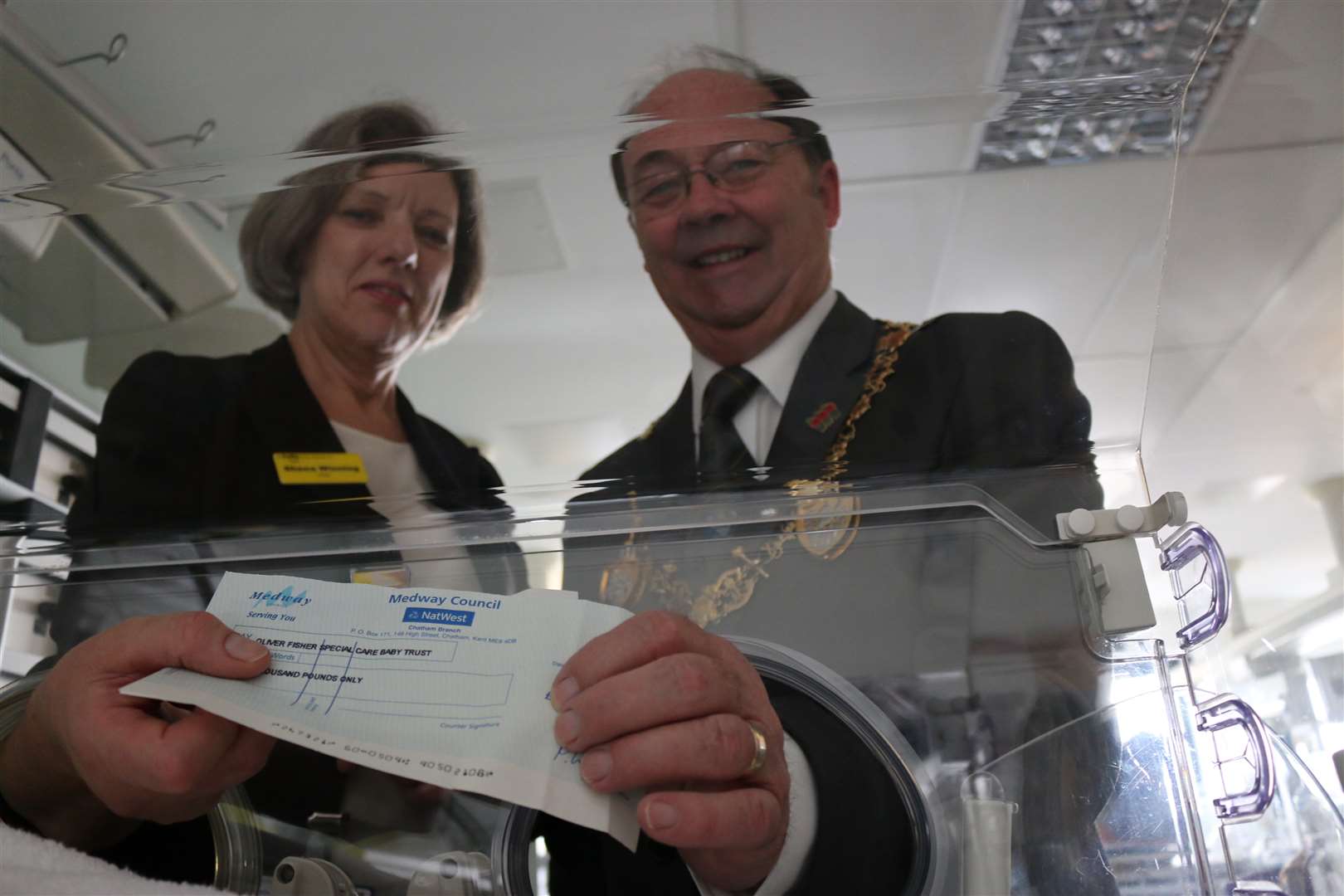 Mayor of Medway Cllr Barry Kemp giving a cheque to the Neo-natal unit, Medway Maritime Hospital