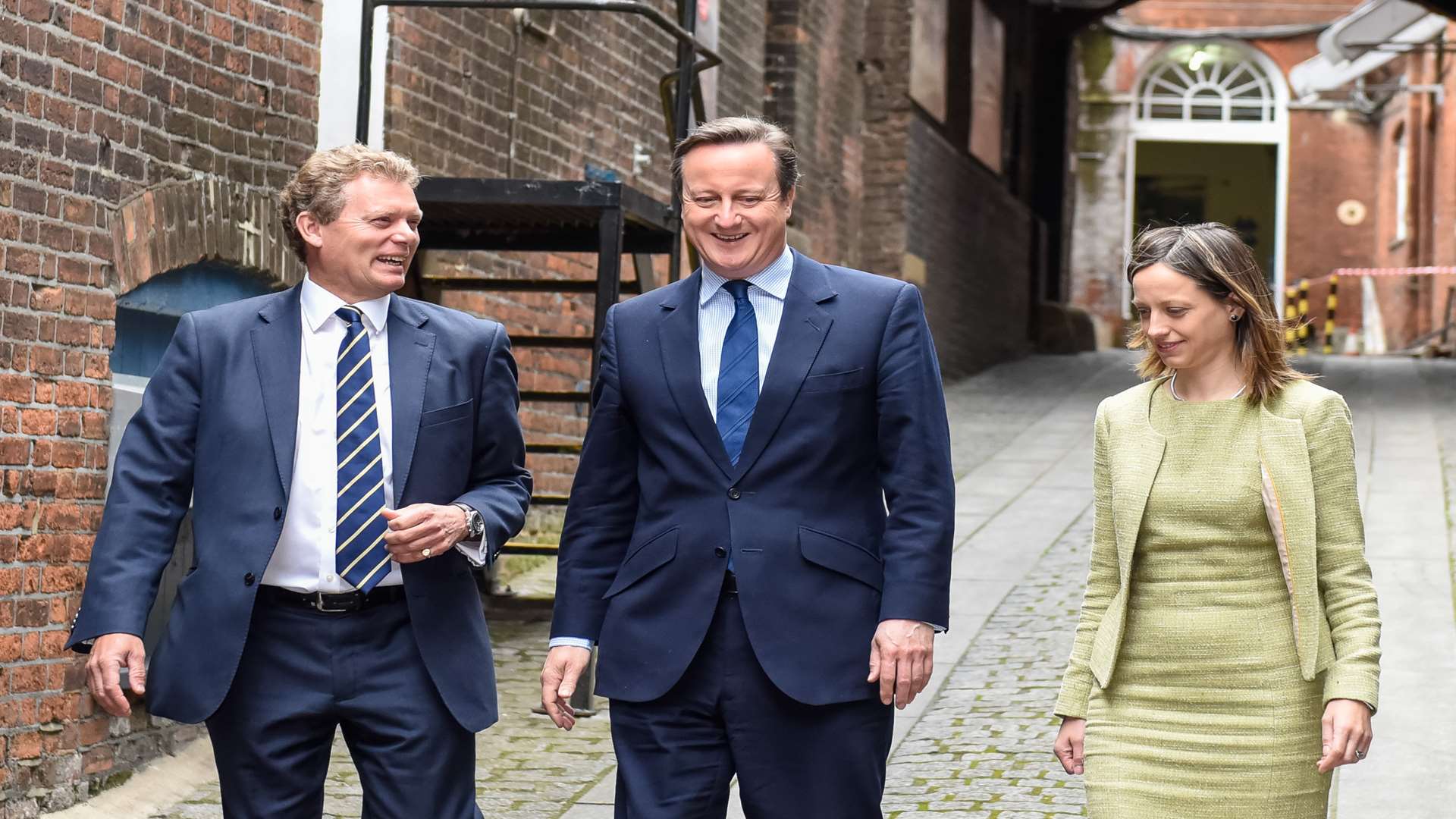 Chief executive of Shepherd Neame Jonathan Neame with Prime Minister David Cameron and Faversham MP Helen Whately in Faversham today.