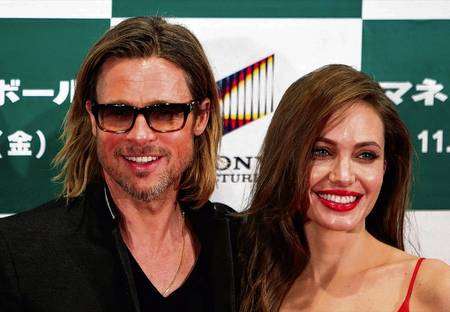 Brad Pitt and Angelina Jolie Picture: AP Photo/Lee Jin-man/PA Photos