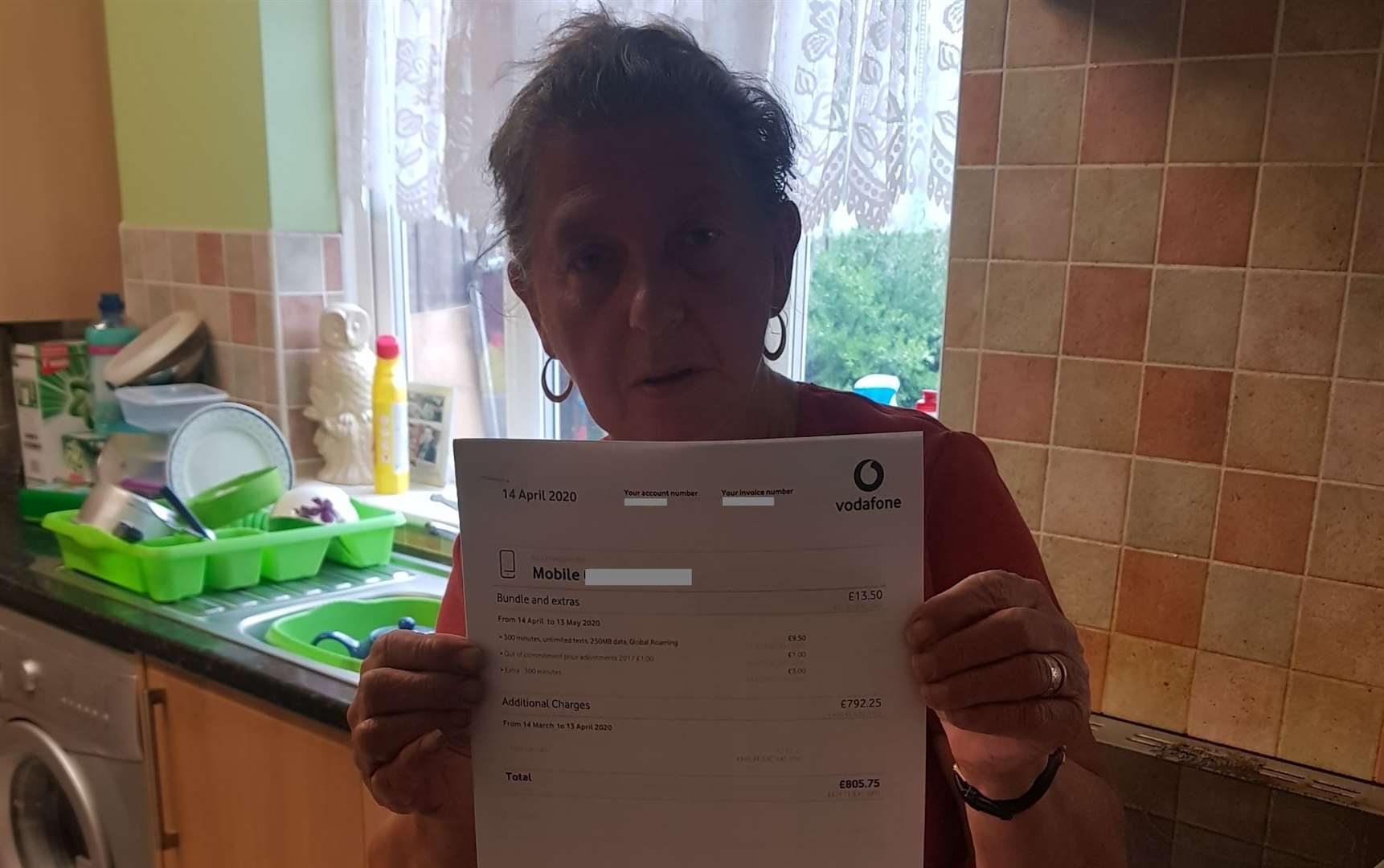 Carole Beaney with her bill from Vodafone. Picture: Lenny Beaney