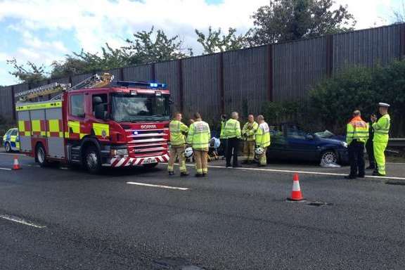 Fire crews cut the roof off a car after crash on M20