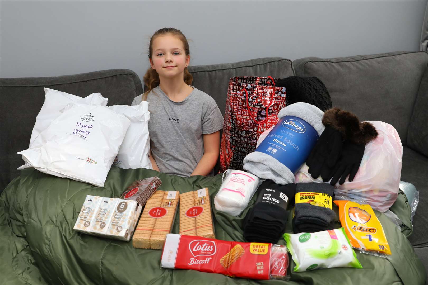 Pictured is 10 year-old Tia Temple who is collecting donations for the homeless