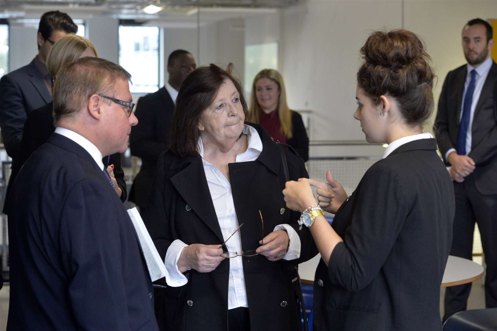 Minister Mark Francis and Medway Council's Jane Chitty talk to a student
