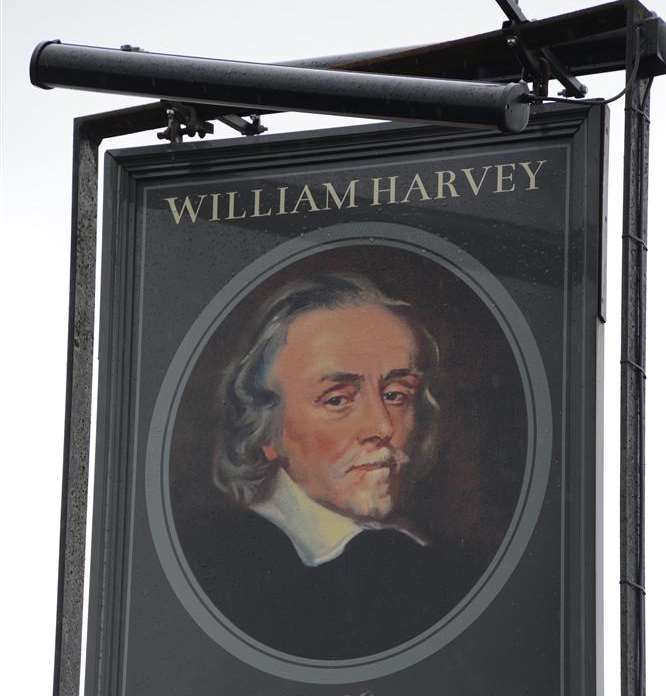 The sign for the William Harvey pub in Ashford