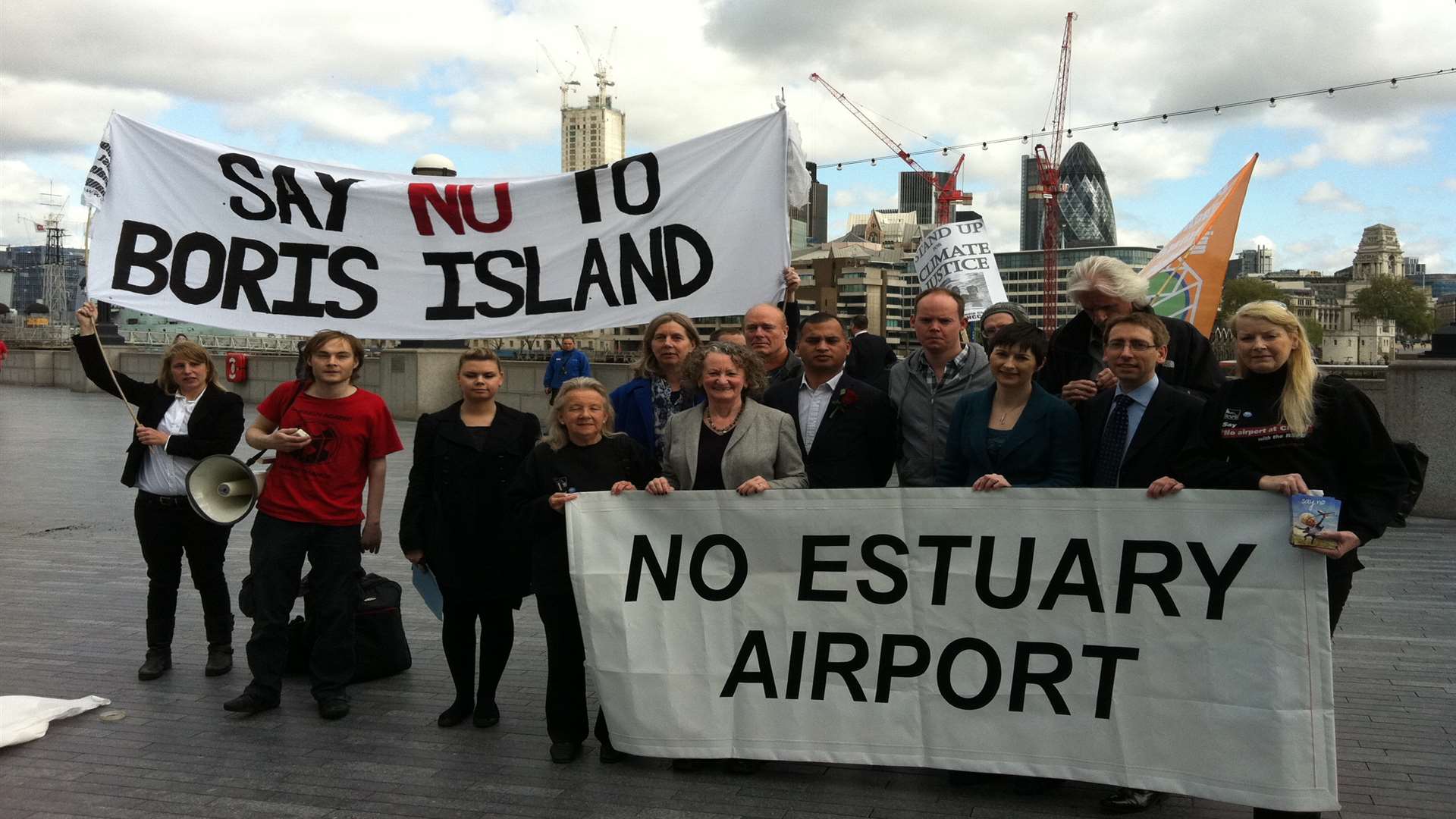 Opponents of a Thames Estuary airport protesting outside City Hall in London