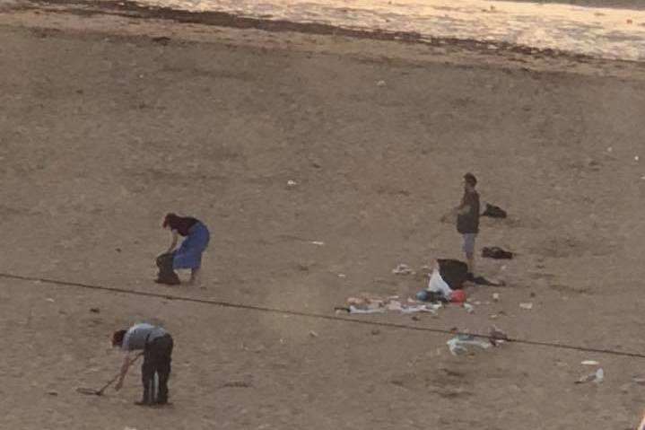 People were spotted clearing the beach in Margate. Pic: Jordan Rowe (2821430)