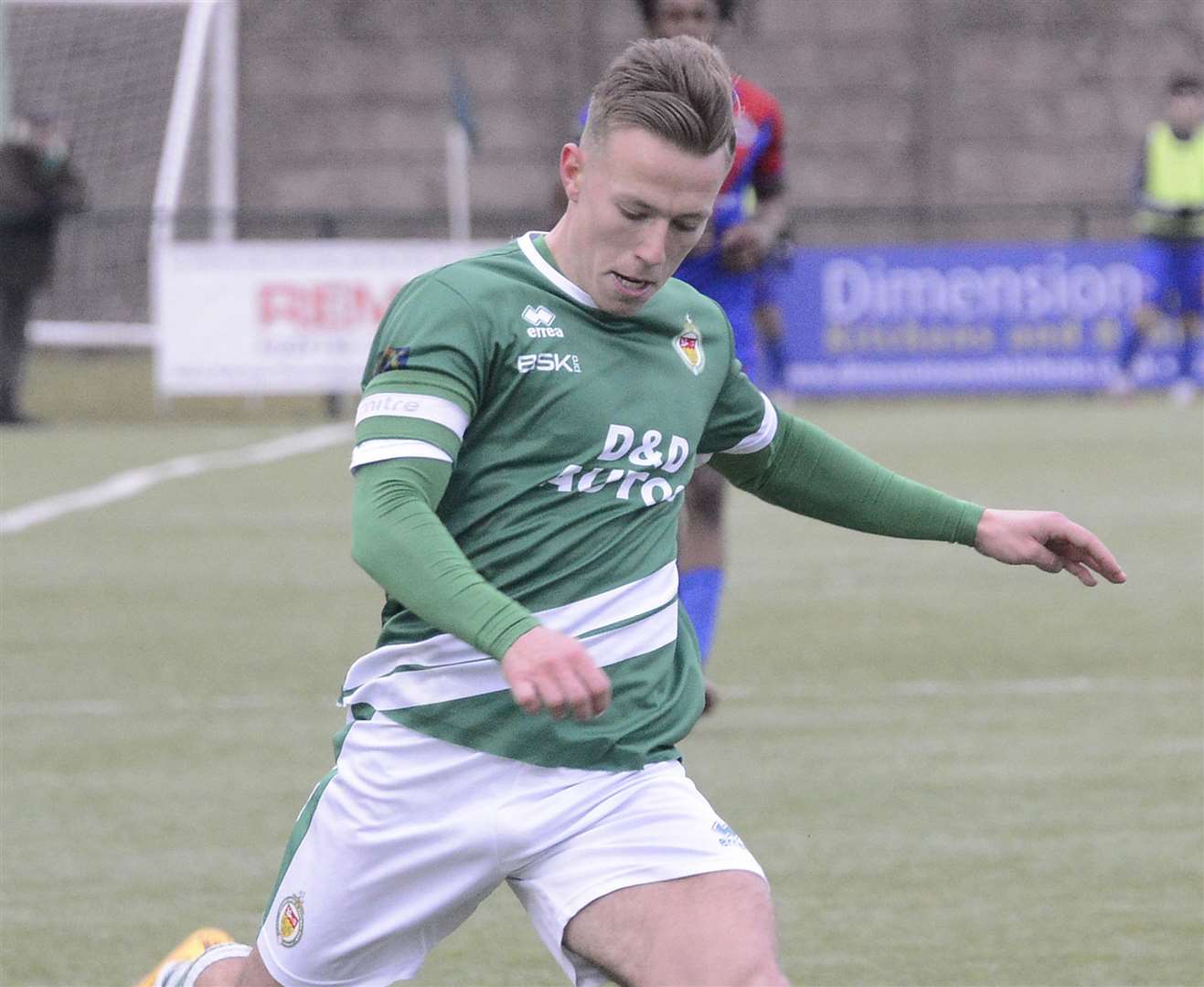 Ashford midfielder Sam Corne takes the game to Greenwich Picture: Paul Amos
