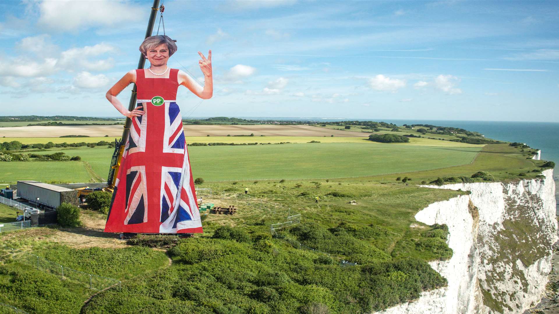 Now we know who was responsible for the huge Theresa May statue flicking the V sign over the White Cliffs of Dover