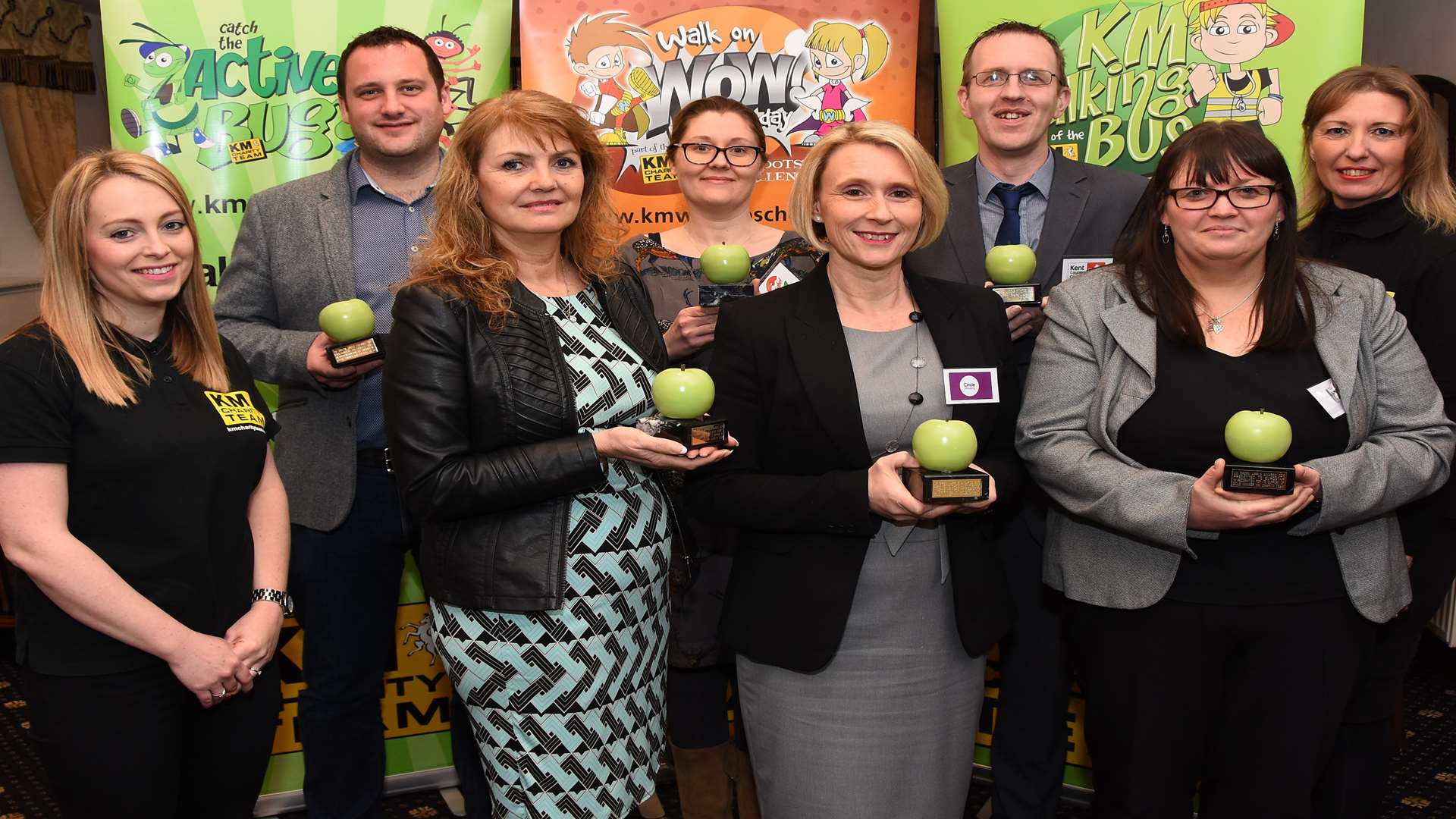 Key KM Walk to School supporters received a replica of the KM Charity Team’s Green Apple Award at the KM Partnership Awards: Specsavers, 3R’s, Golding Homes, Circle Housing Russet, KCC, Medway Council, Bel UK and Eurostar.
