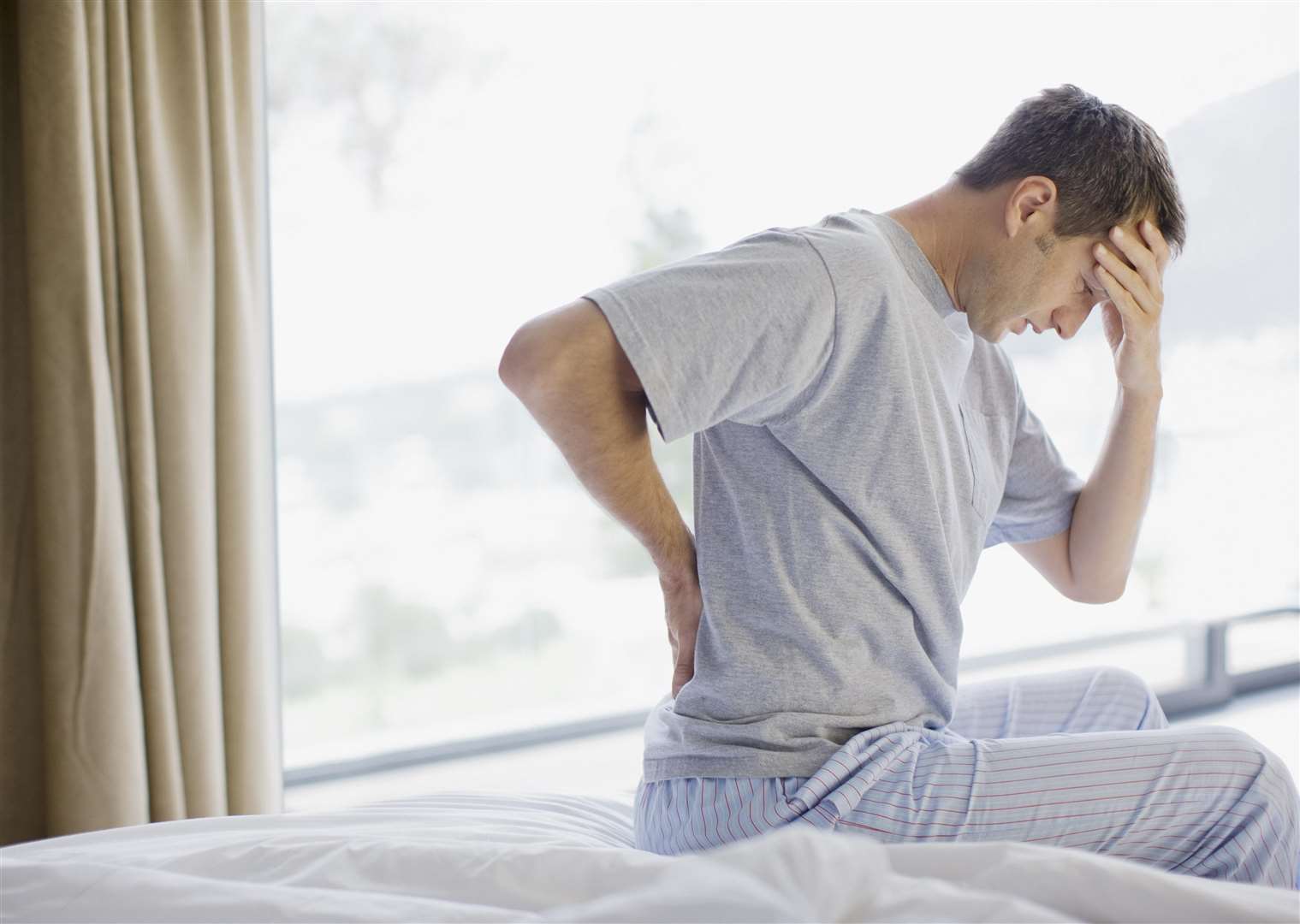 Adults with back pain in Kent are more likely to suffer from depression. Picture: Getty Images