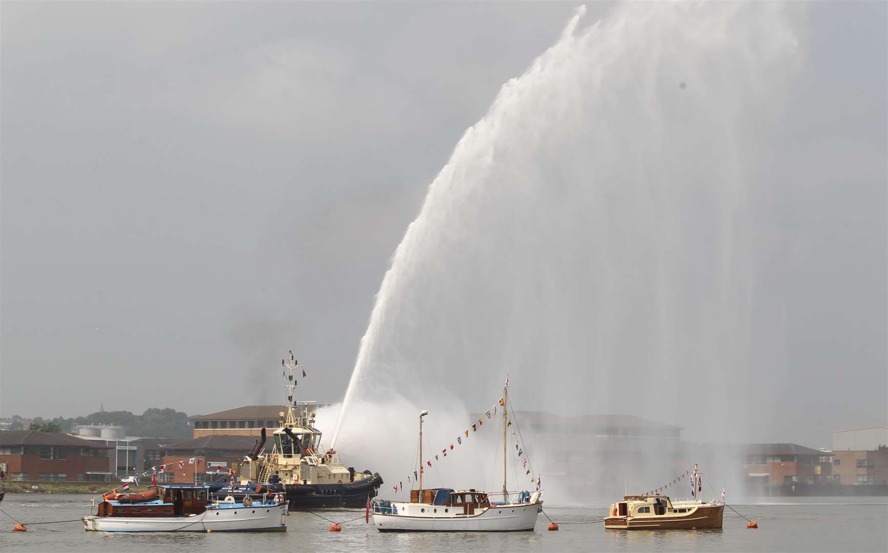 A fire boat shoots water in the air at a previous festival on the Medway Picture: John Westhrop