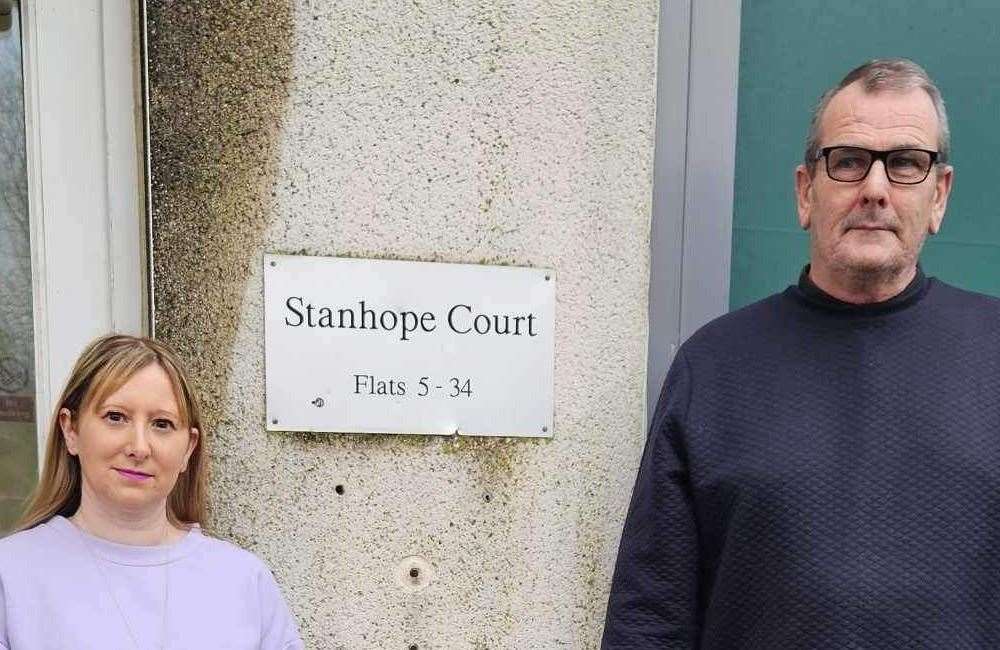 Concerned residents Stef Webster and Ian Bugden outside Stanhope Court in Ashford
