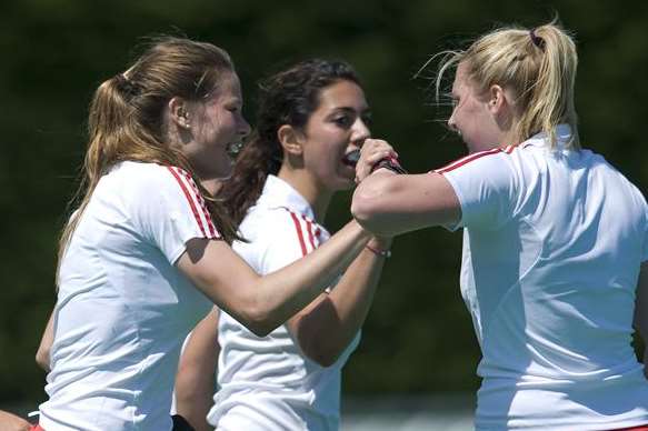 Canterbury's Eliza Brett (left) celebrates a goal with Lucy Hyams (right) during an England training international match at Polo Farm Picture: Ady Kerry / England Hockey