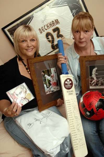 Alison Lang and Karen Washington with just a few of the items which are up for auction on the Daisy Washington charity day