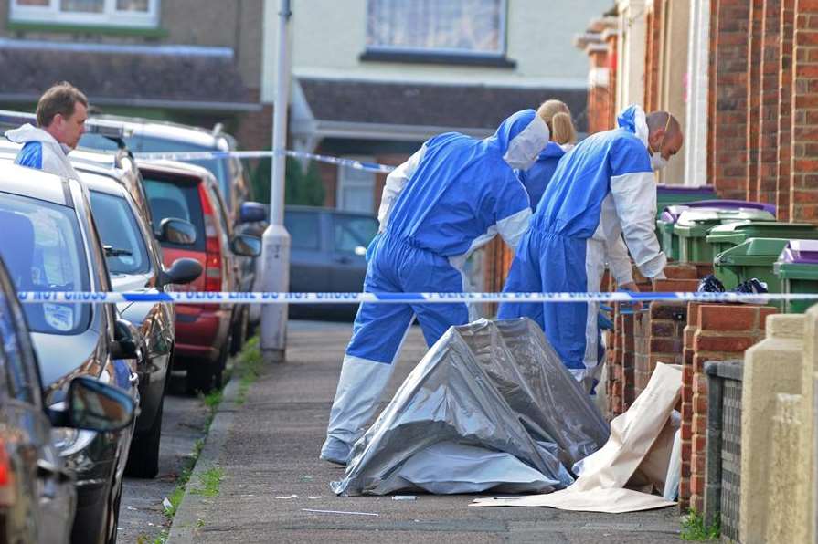 Forensics officers at the scene in Folkestone