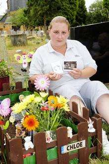 Claire Walkling by daughter Chloe's grave