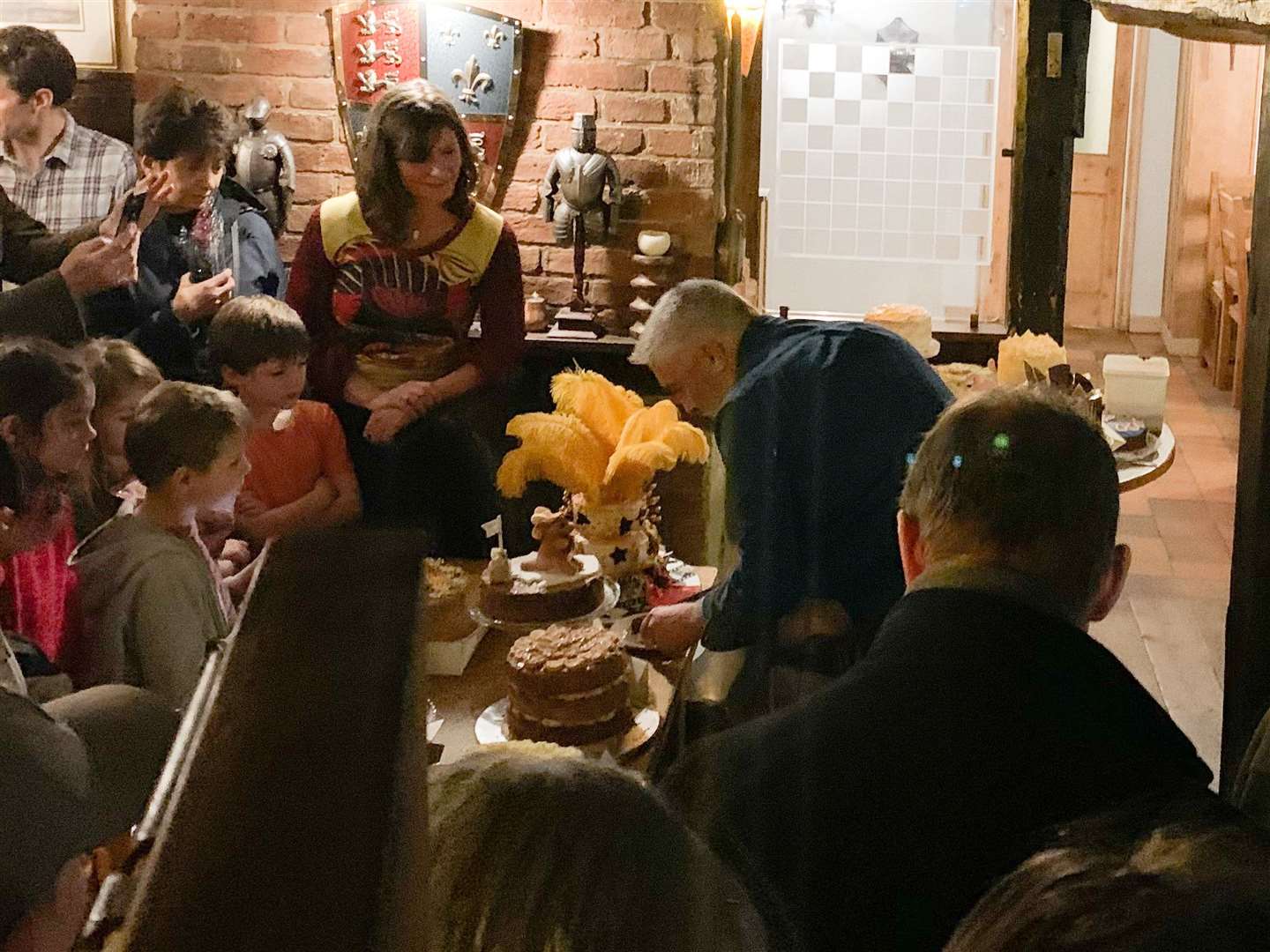 Paul Hollywood at a charity cake baking contest in The Chequers Inn