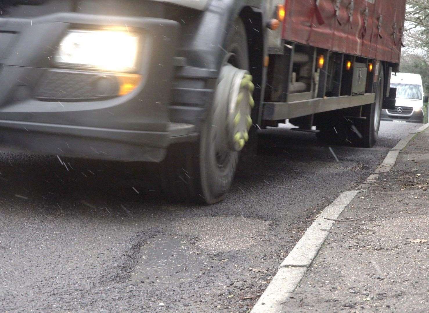 The road is often used by HGVs which Cllr Ward says has a negative impact on existing potholes