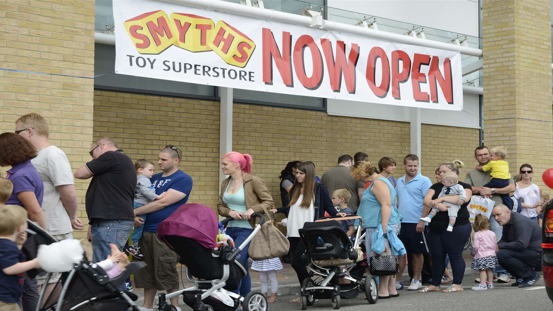 Queues outside the Smyths store opening at the South Aylesford Retail Park in 2013.