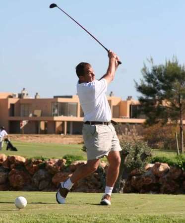 Steve Lovell tees off on his way to victory in Portugal