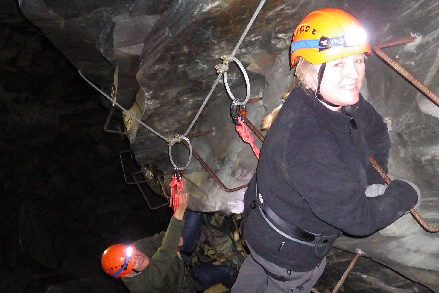 KM Group journalist Mary Louis climbing high deep inside Honister Slate Mine, Borrowdale, in the Lake District. Picture: Steve Hudson, Honister Slate Mine.