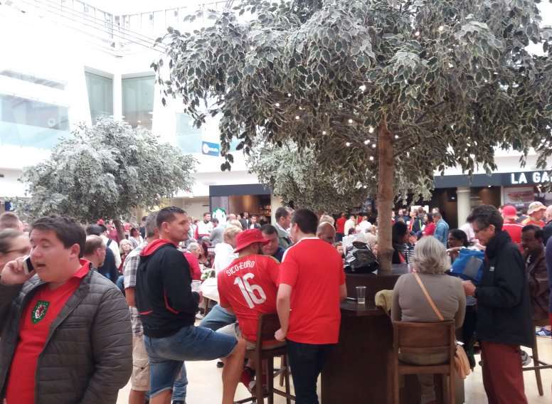 Anxious Wales fans wait in the terminal. Picture: Gwen Williams