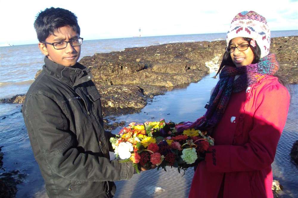 Hansaka Seneviyatne, 14 and Hiruni Senaratne, 11, lay a wreath for charity KASTDA in the North Sea at Margate in memory of the more than 30,000 Sri Lankans who died in the 2004 Boxing Day tsunami.