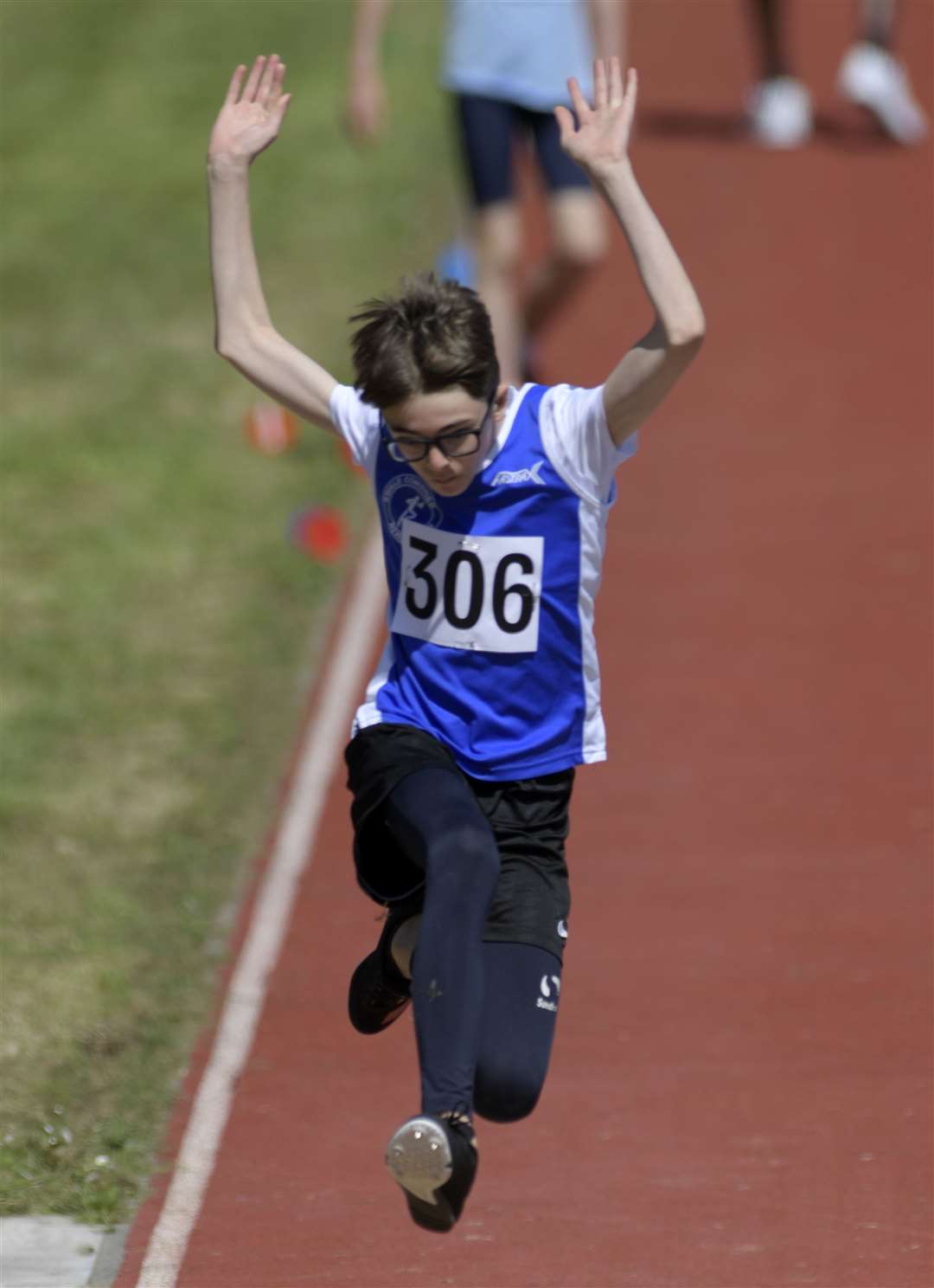 Alfie Hughes of Swale Combined AC.leaps into long jump action in the under-15 boys' category. Picture: Barry Goodwin (56693759)