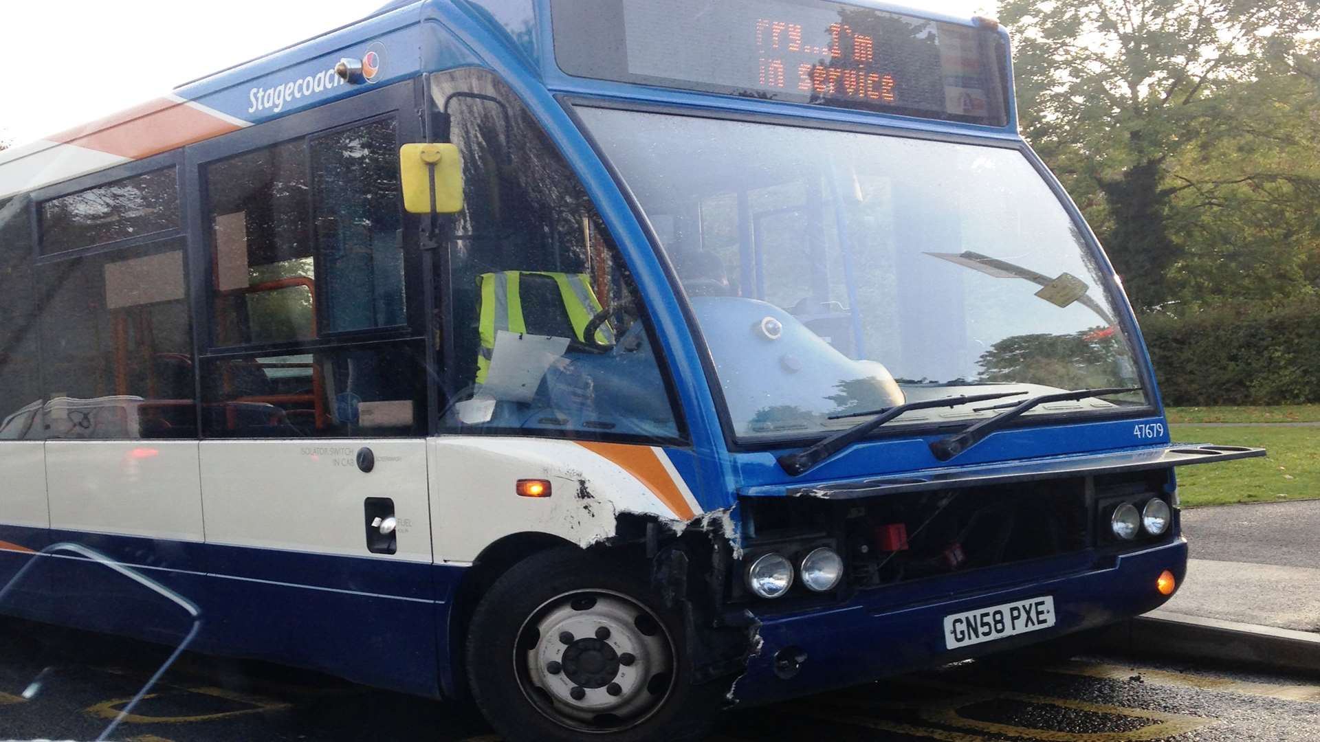 The bus was visibly damaged after the early-morning prang