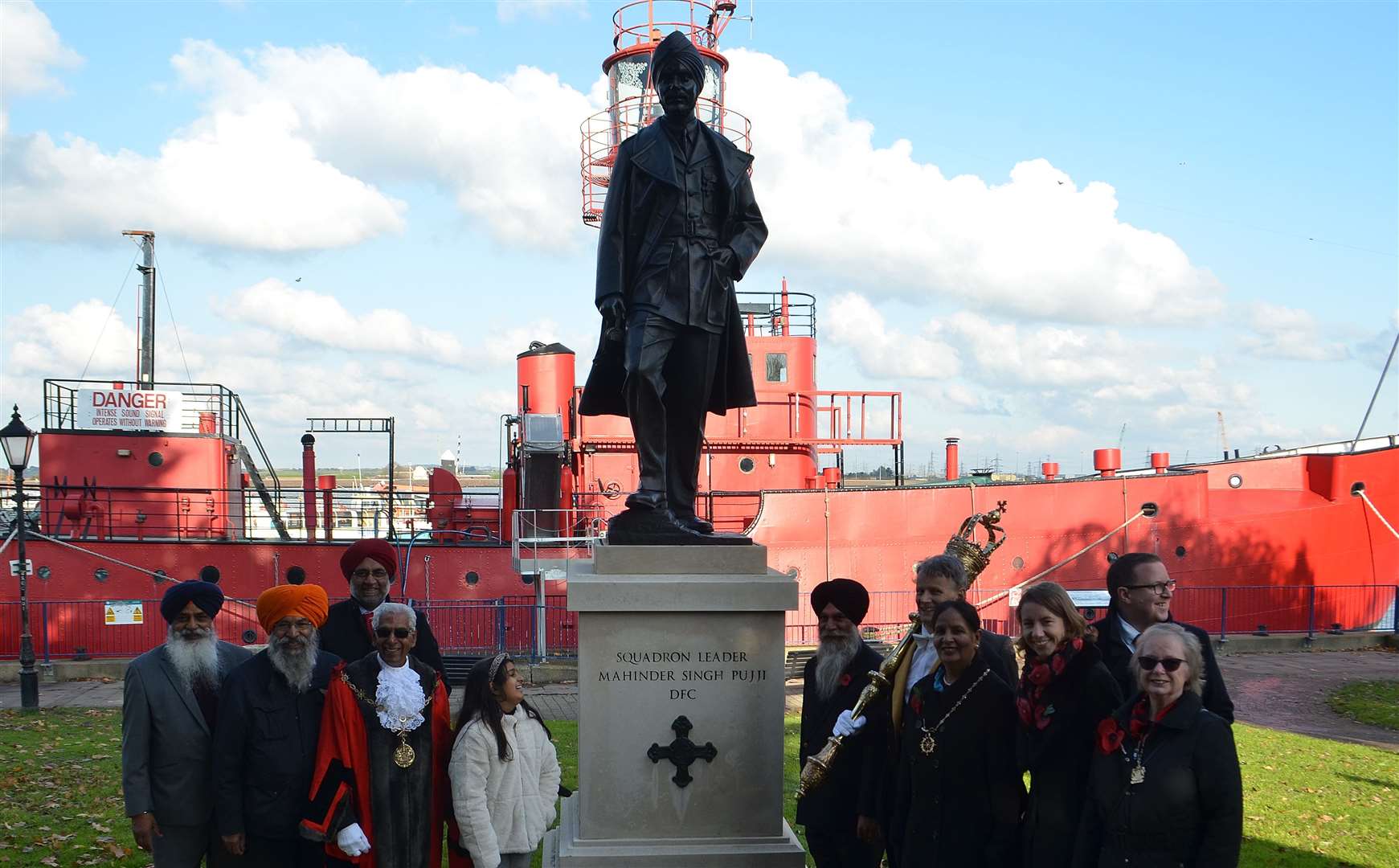 Members of the Sikh community at the RAF Squadron Leader Mohinder Singh Pujji statue in Gravesend. Picture: Jason Arthur
