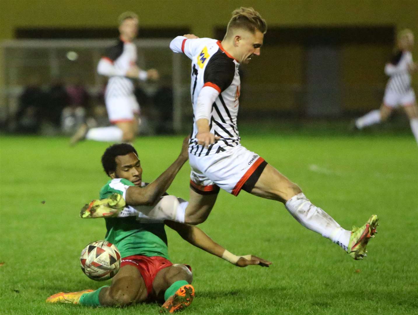 Deal's Tom Chapman rides a tackle against Sporting Bengal. Picture: Paul Willmott