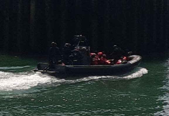 A Border Force search and rescue boat yesterday bringing a small group of people ashore. Picture Sam Lennon KM GROUP