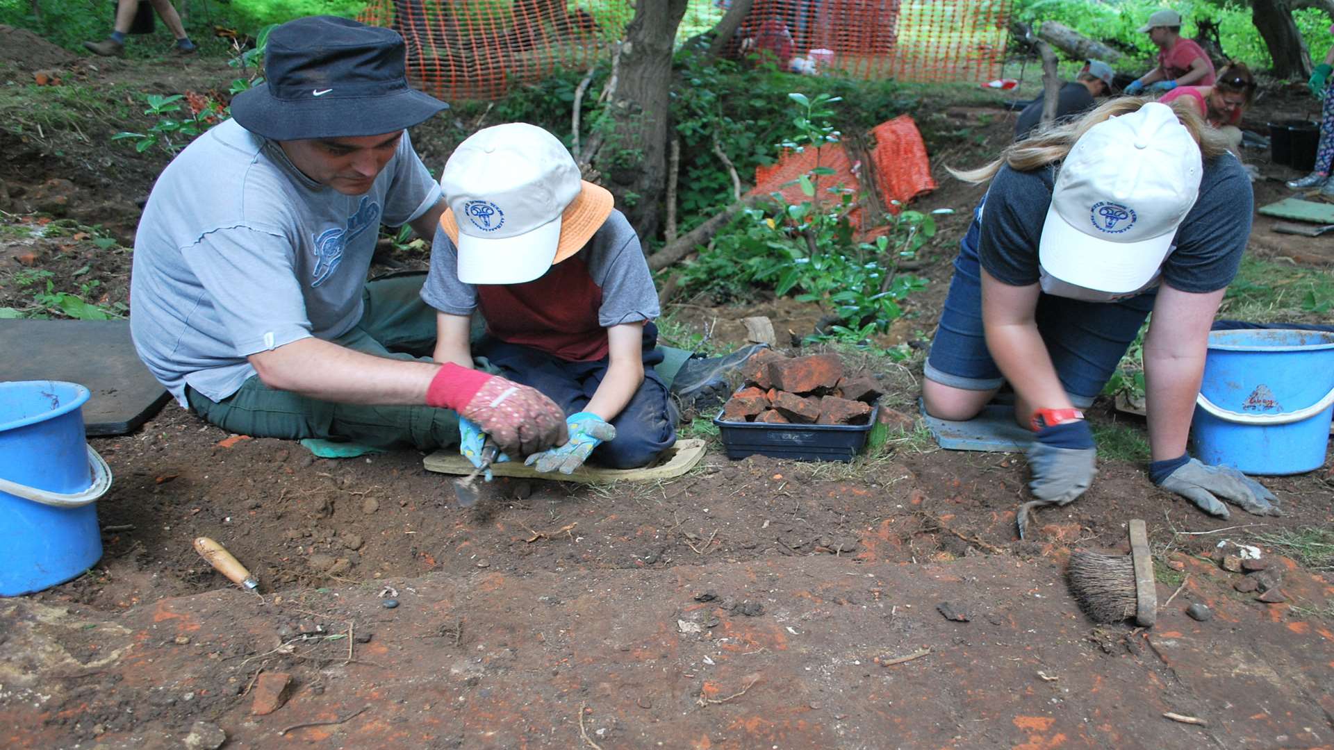Archaeologists of all ages have been digging in Cobham Wood. Picture: Andrew Mayfield