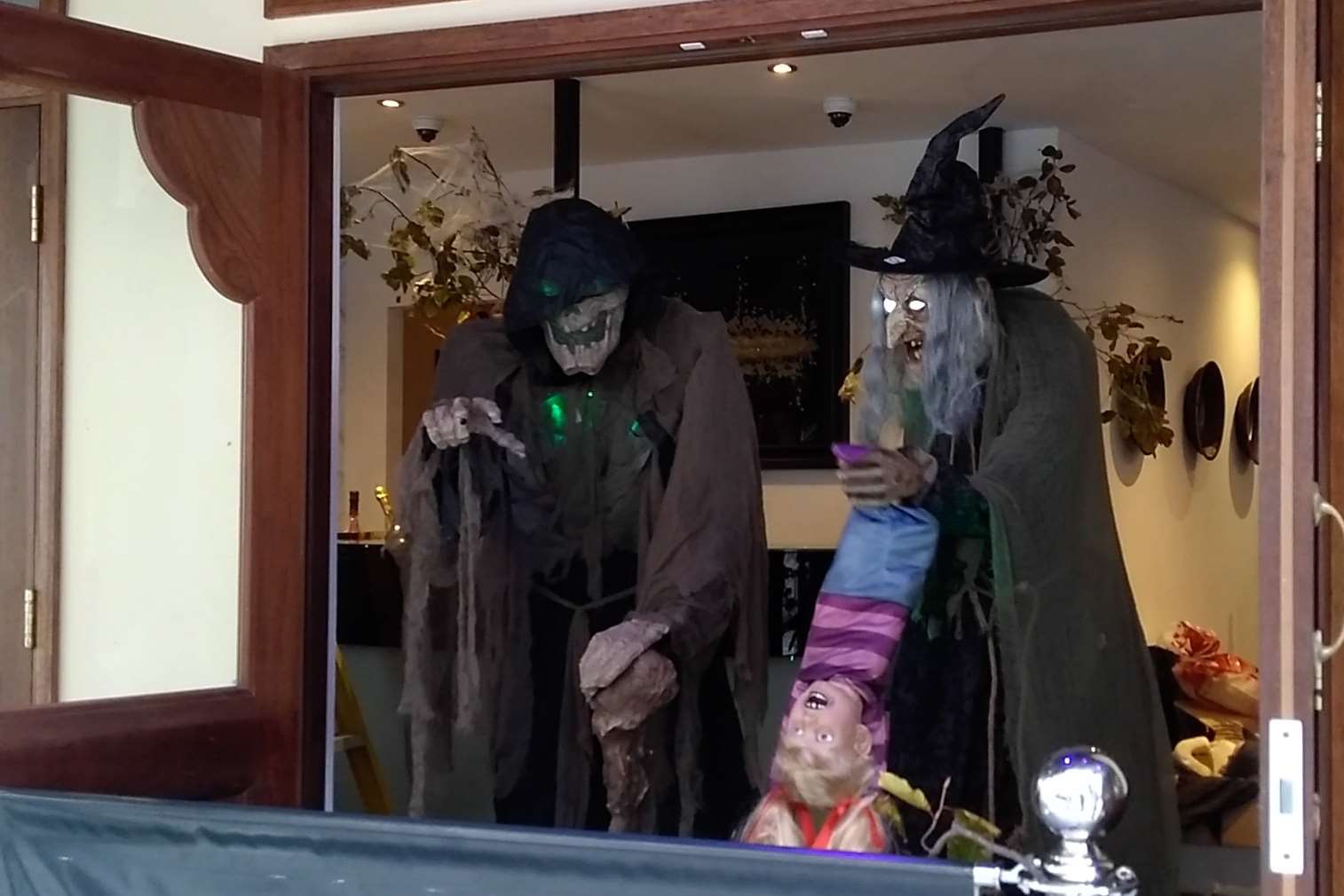 A ghoulish figure and witch have been placed outside the nightclub