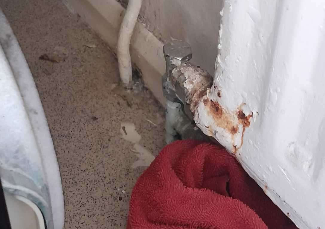 Water damage to radiators in Luke's home. Picture: Luke Hutson