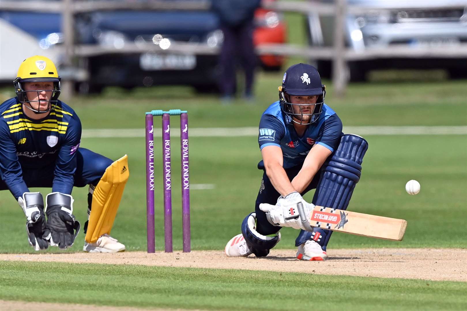 Kent Spitfires opener Ollie Robinson reverse sweeps against Hampshire. Picture: Keith Gillard (50009969)