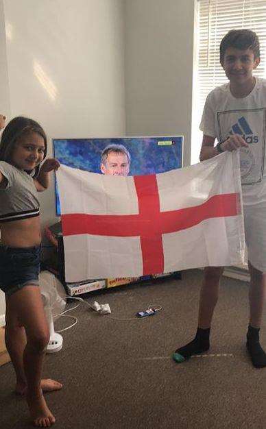 Marie and Mikey with their England flag. Picture: Kelly Turner Beadle (2926043)