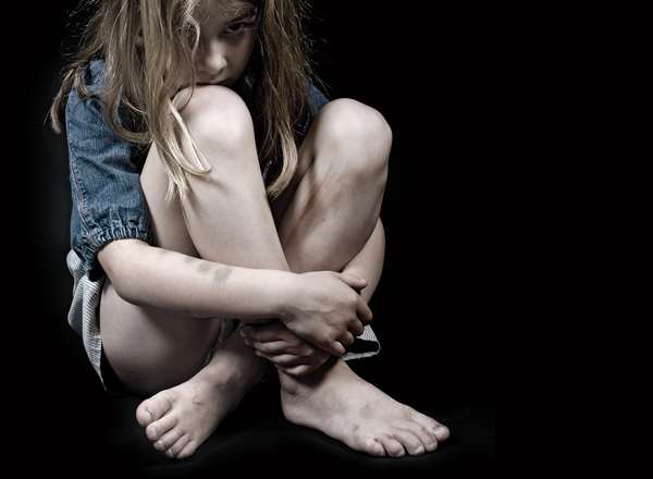 Coles abused the girl repeatedly. Stock image posed by model